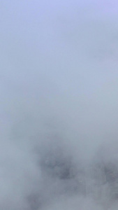 云雾中的城市青岛航拍视频海滨风光视频