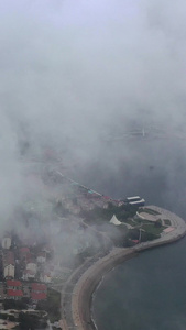 云雾中的城市青岛航拍视频cbd视频