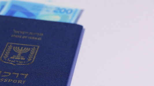 200谢克尔和Israeli护照左面纸视频