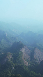 航拍湖南5A级景区崀山山顶欣赏风景的拥挤旅游人群素材风景素材视频