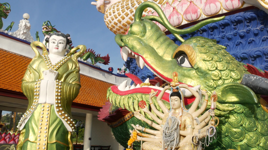 佛寺院子里的观音像东方国家传统佛教寺庙院子里的多臂视频