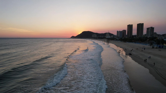 大海日落晚霞夕阳海浪海陵岛航拍视频