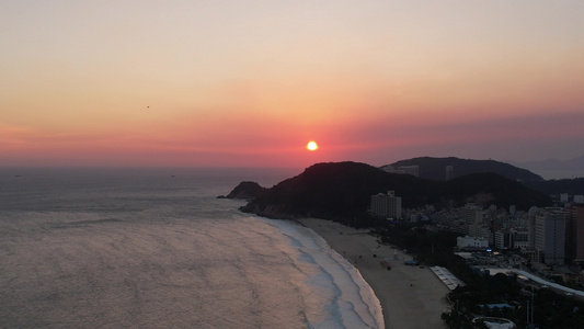 大海日落晚霞夕阳海浪海陵岛航拍视频