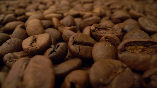 咖啡豆背景关闭咖啡种子的种子视频
