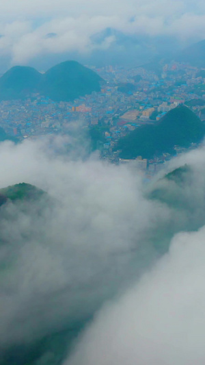 航拍清晨山峰平流雾连绵起伏48秒视频