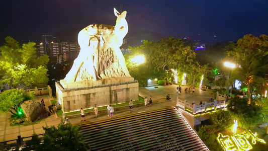 高视角城市灯光下的海南三亚鹿回头空镜头航拍风景视频