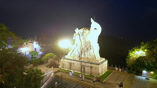 高视角城市灯光下的海南三亚鹿回头空镜头航拍风景视频