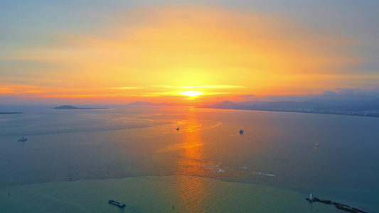 海南三亚三亚湾城市夕阳晚霞4k航拍全景天空视频