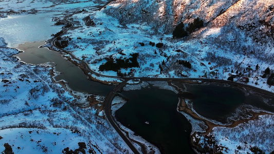 4K航拍北欧挪威斯沃尔维尔雪山美景视频