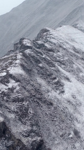 航拍被雪覆盖的山梁大山视频素材灾害性天气视频