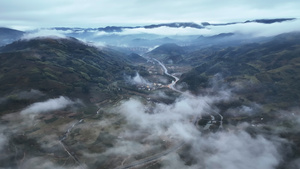 航拍雨后清晨云雾中的云海山峰乡村4k素材43秒视频