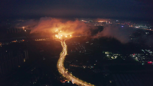 航拍云雾中的立交桥和道路视频