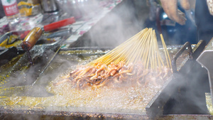 城市美食街餐饮美食铁板鱿鱼4k素材24秒视频