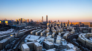 8K冬季济南雪景眺望中央商务区金色光影延时10秒视频