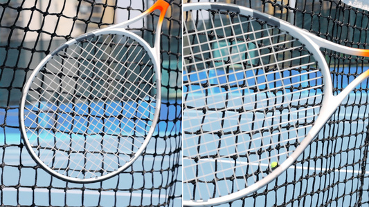 网球拍划过球网的特写镜头视频