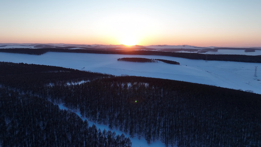 冬季林区山林雪野夕阳视频