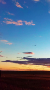 60帧延时拍摄鄂尔多斯草原地平线上日落的景象草原风光视频