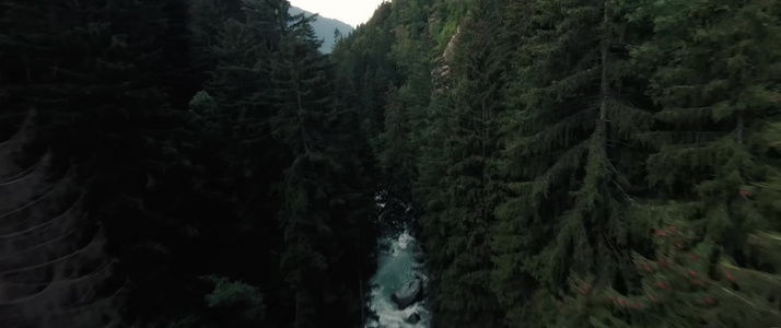 穿越机航拍森林吊桥河流瀑布视频
