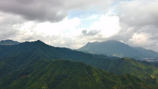 白云下的山区县城村庄风景视频