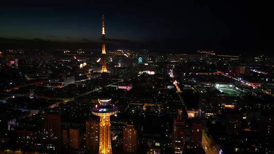 夜晚的哈尔滨龙塔城市夜景航拍风景素材视频