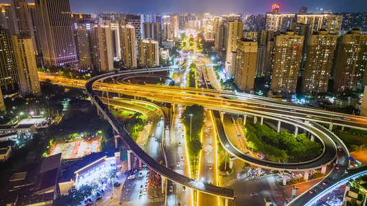 海南海口国贸大道高架桥城市夜景交通车流航拍延时视频