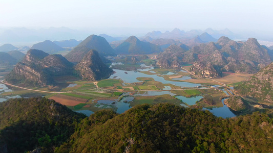 航拍5A景点万峰林立的水上田园湿地公园普者黑景区视频视频