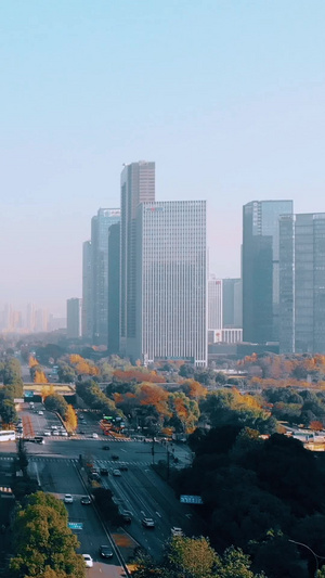 航拍俯拍杭州CBD高楼下的城市道路13秒视频