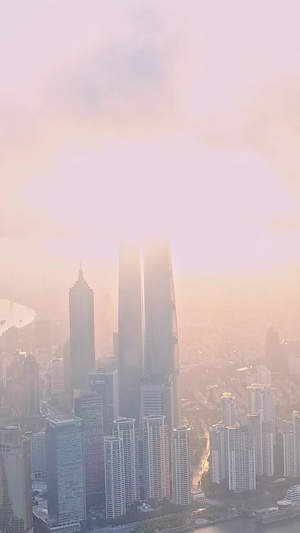 逆光晨雾日出上海航拍城市风光10秒视频