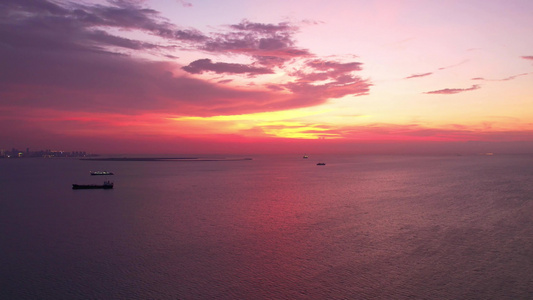 海南省海口市台风来临前的城市晚霞风光夜景延时航拍视频