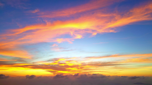 海南三亚三亚湾海洋天空日落夕阳晚霞火烧云航拍风景视频