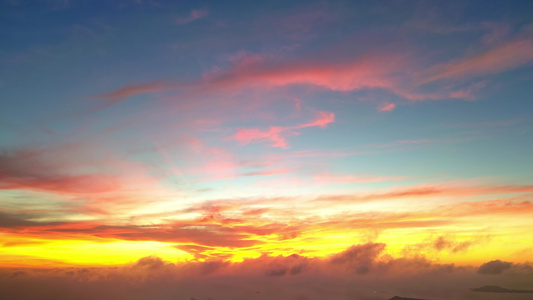 海南三亚三亚湾海洋天空日落夕阳晚霞火烧云航拍风景视频