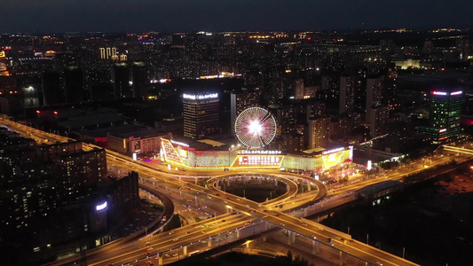 长春市经开区摩天活力城交通立交桥夜景航拍视频