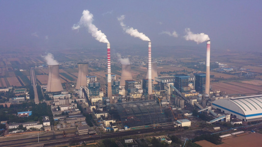 4K航拍陕西火力发电厂烟囱浓烟素材视频