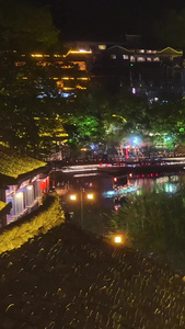 航拍湖南湘西土家族4A级旅游凤凰古城沱江夜景人群素材4A级景区视频