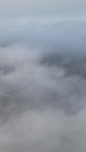 航拍大雾天气天空云层之上自然山脉农业乡村农田村庄素材乡村素材视频