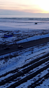 航拍雪地上的公路旅游风景视频