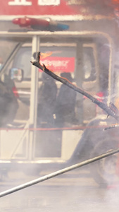 慢镜头升格拍摄城市消防演习现场火焰被消防员水带扑灭素材火焰素材视频