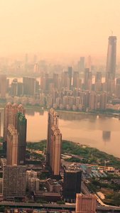 航拍夕阳下的武昌城市主干道和湖泊视频