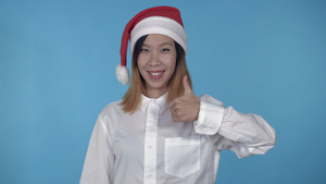 美丽的韩国女性头戴圣诞帽点赞8秒视频