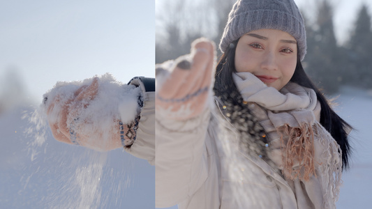 4K美女冬天雪景玩耍手握雪花视频