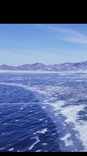 航拍赛里木湖冰面广阔湖景 电影调色41秒视频