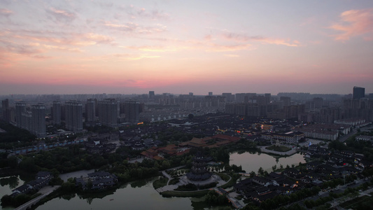 城市日落晚霞夕阳火烧云自然风光航拍视频