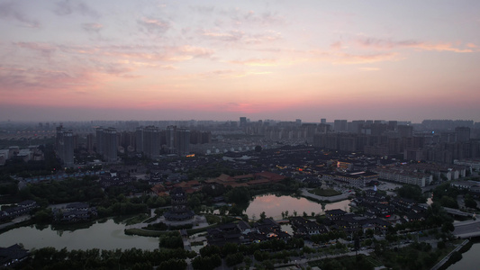 城市日落晚霞夕阳火烧云自然风光航拍视频