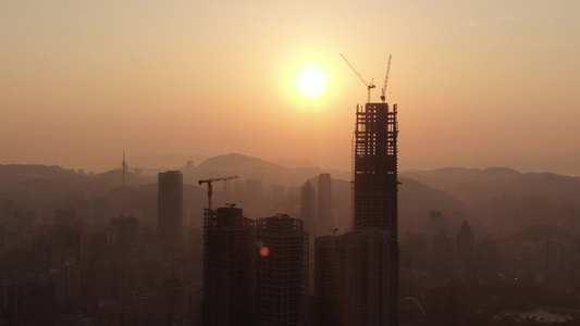 城市日落晚霞夕阳火烧云自然风光航拍视频