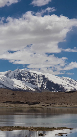 5A帕米尔高原景区葱岭圣湖与公格尔九别峰延时视频昆仑山脉16秒视频