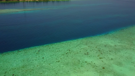 蓝海和清洁沙地背景的豪华海滩海滩时间观光旅游视频