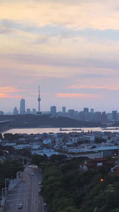 航拍风光城市环绕飞行夕阳晚霞落日余晖天空下的武汉5A级旅游景区黄鹤楼素材城市建设视频