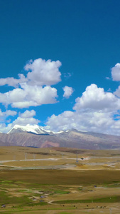 航拍西藏317国道雪山晴空素材蓝天白云视频