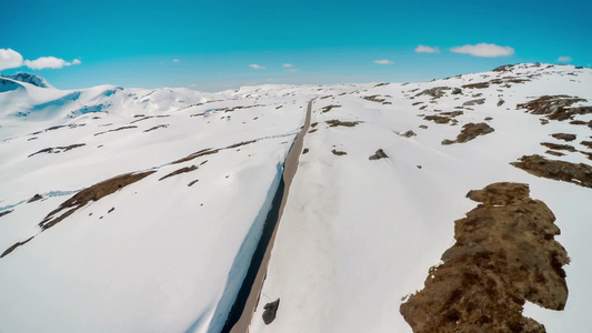 航拍高原雪山地公路视频