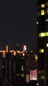 航拍城市夜景写字楼互联网公司灯火通明办公楼加班素材商务建筑视频